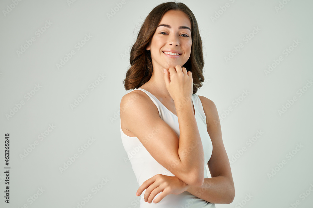 pretty woman holding hands near face fashion hairstyle grooming studio pretty woman holding hands near face fashion hairstyle grooming studio