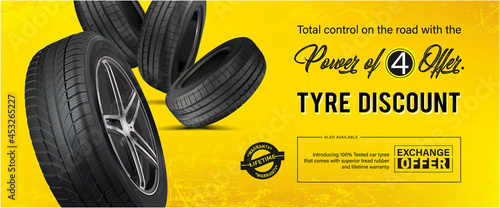 Tyre discount. Advertisement flyer in yellow background. Promo action for buying four car wheels.  photo