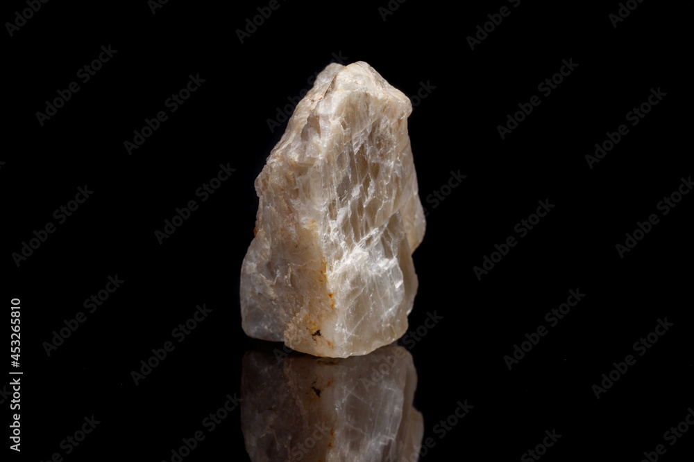 Macro mineral stone Moonstone a black background Macro mineral stone Moonstone a black background