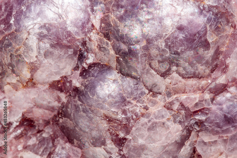 Macro mineral stone Lepidolite in the rock a white background Macro mineral stone Lepidolite in the rock a white background