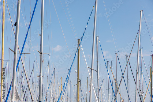 Sailing boat masts in a harbor