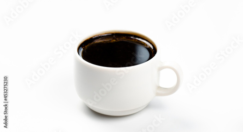 A cup of coffee. Espresso. On the table. On white background.