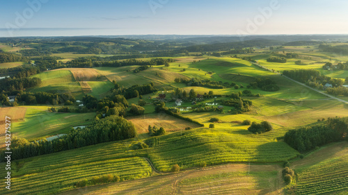 Beautiful green hills at the morning - aerial view photo