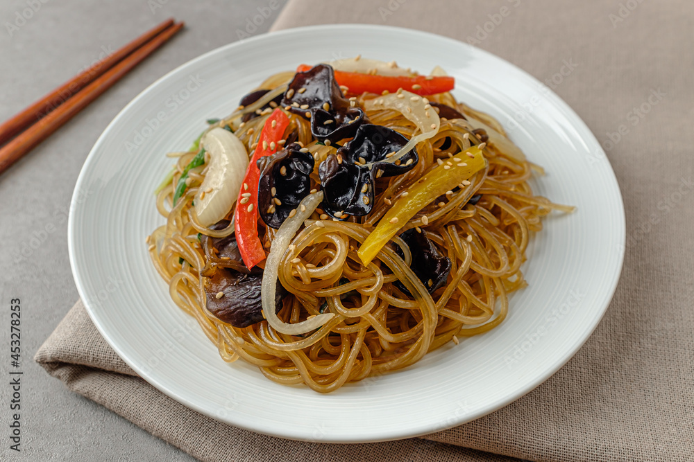 Korean food Japchae with vermicelli and vegetables