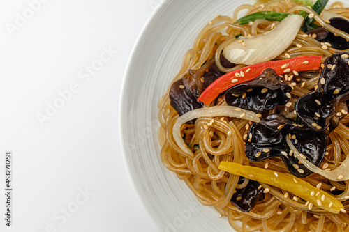 Japchae on a white background photo