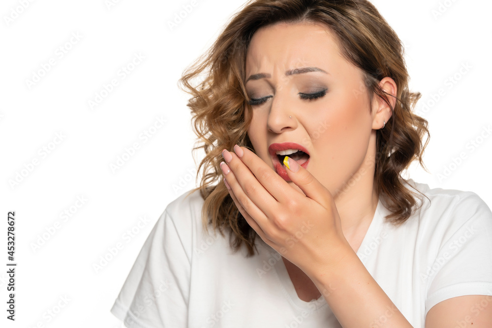Woman sneezing or coughing, isolated on white. Woman sneezing or coughing, isolated on white.