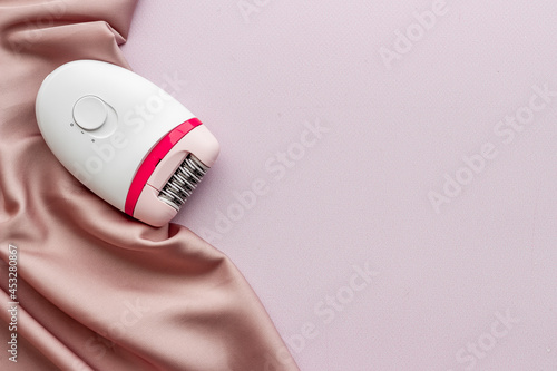 Hair remover epolator on silk - for gentle depilation