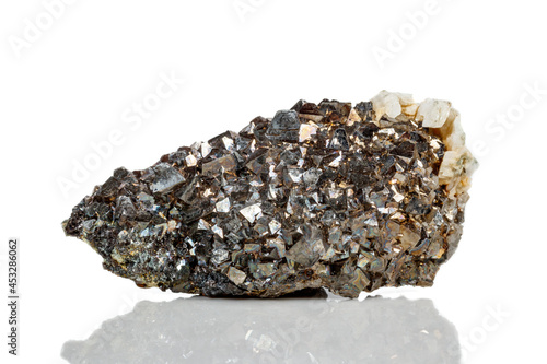 Macro mineral stone Arsenopyrite on a white background photo