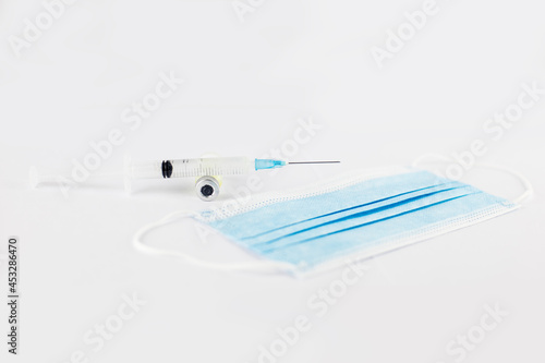 Vaccine injection and a surgical mask