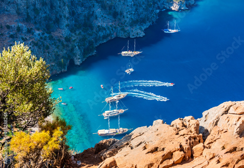 Butterfly Valley (Turkish: Kelebekler Vadisi) is a valley in Fethiye district, Mugla Province, on the Mediterranean coast of Turkey. Oludeniz - Fethiye, Mugla, Turkey. photo