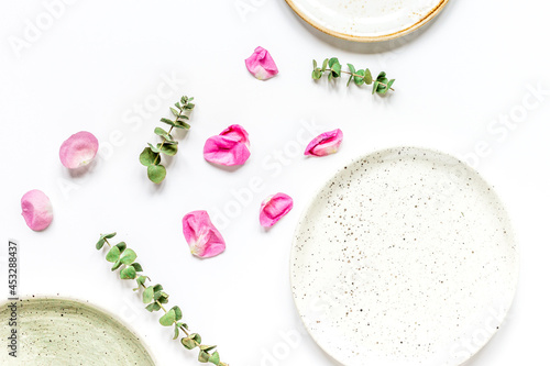 spring floral design with rose petals in soft light top view mock-up
