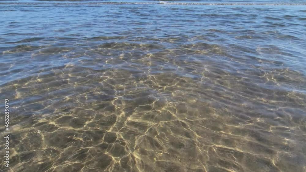 Transparent sea water on the beach Transparent sea water on the beach
