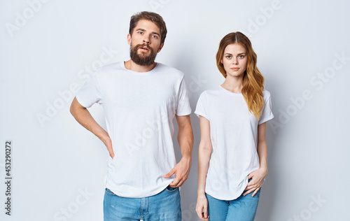 man and woman wearing white t-shirts fashion studio design casual wear