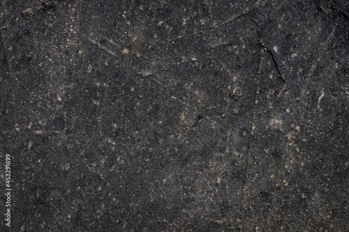 texture of dark granite nature stone - grunge stone surface background