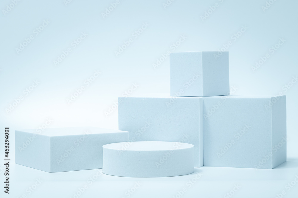 Geometry shaped podium for mock up presentation in gray color and minimalist style with copy space, abstract background design. Blank product shelf standing backdrop. Geometry shaped podium for mock up presentation in gray color and minimalist style with copy space, abstract background design. Blank product shelf standing backdrop.