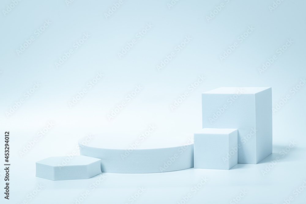 Geometry shaped podium for mock up presentation in gray color and minimalist style with copy space, abstract background design. Blank product shelf standing backdrop. Geometry shaped podium for mock up presentation in gray color and minimalist style with copy space, abstract background design. Blank product shelf standing backdrop.