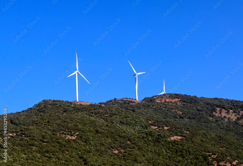 wind turbines in the plain in the hills. wind turbines in the plain in the hills.
