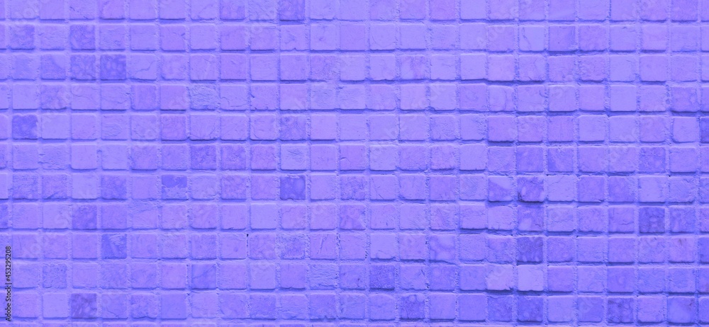 Lilac mosaic texture. Ceramic mosaic texture. Small stone tiles. Horizontal square abstract background. Lilac mosaic texture. Ceramic mosaic texture. Small stone tiles. Horizontal square abstract background.