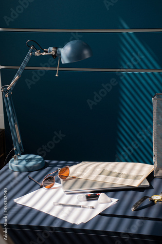 Obraz na plátne business lifestyle chancellery equipment lamp, white sheet of paper, pens, conce