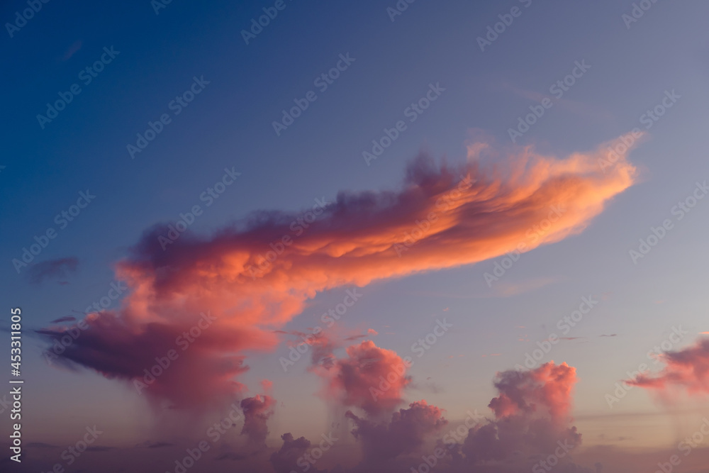 Fototapeta premium Beautiful colored cloudy evening sky. Abstract sky background.