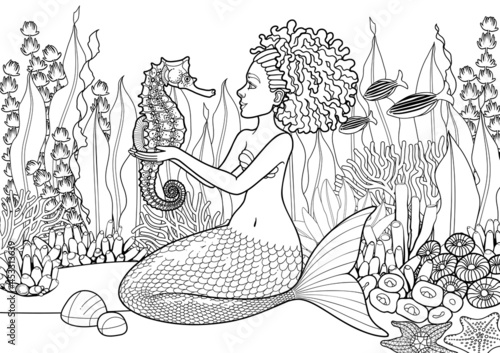 Graphic african mermaid sits on the sandy ocean bottom and plays with the seahorses