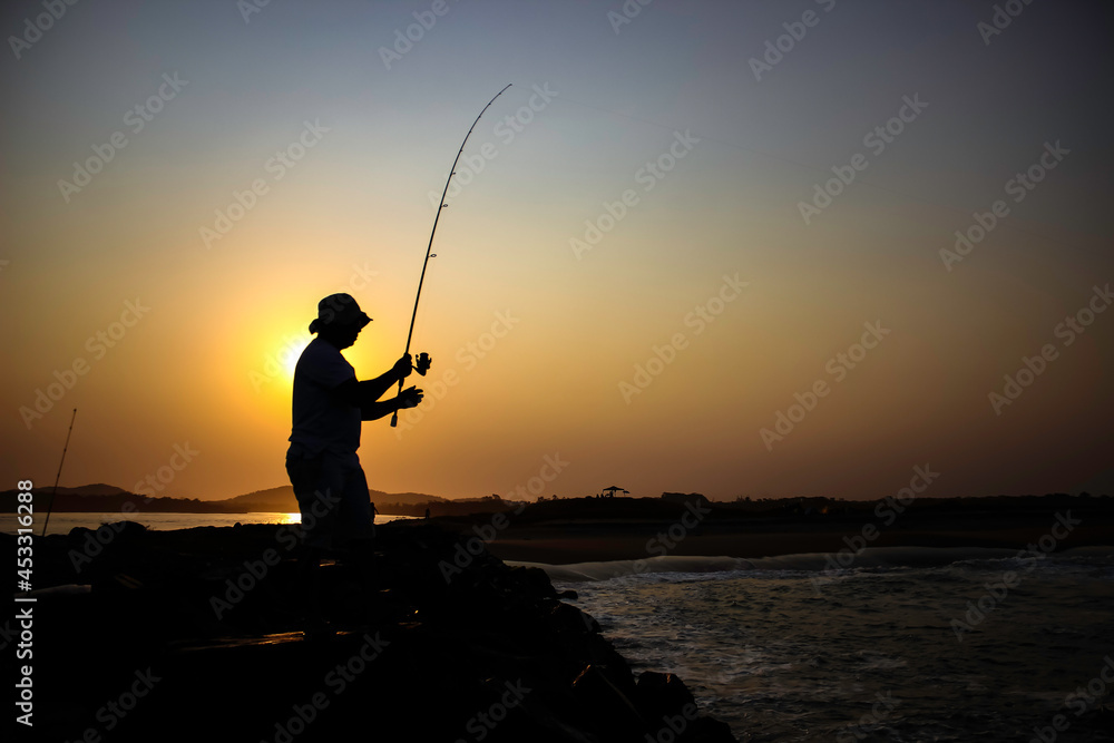 Fishing, fisherman, fish, sunset, beach, silhouette, sun, sport fishing, water, ocean, sun, boy, hobby, sun, sport, 