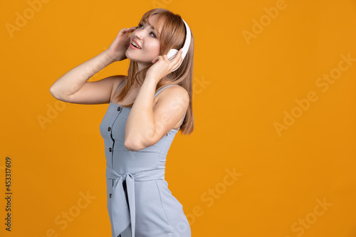 Horizontal portrait of young beautiful girl isolated on yellow studio background. Concept of human emotions, facial expression, youth, sales, ad.
