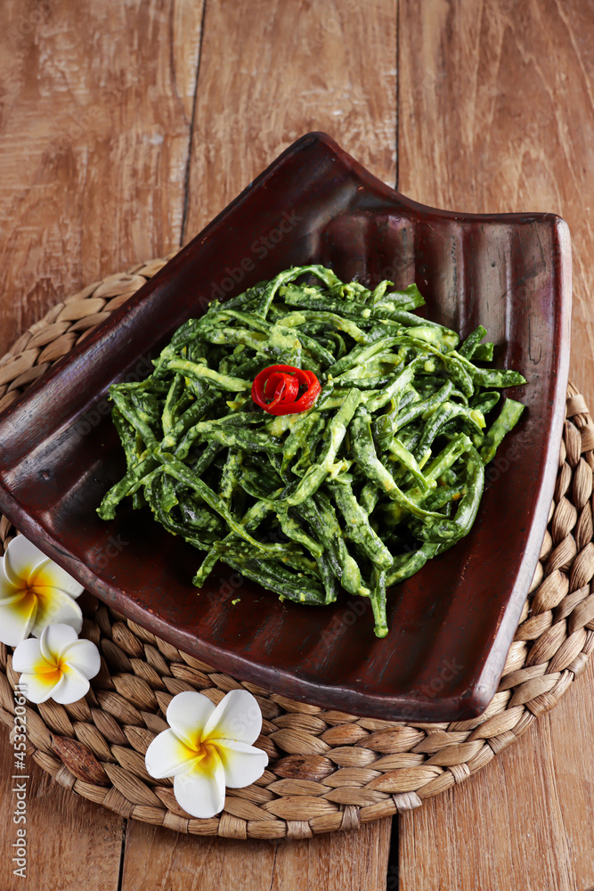 Jukut Bejek is Balinese traditional dish consist with long beans, coconut milk and other spices.