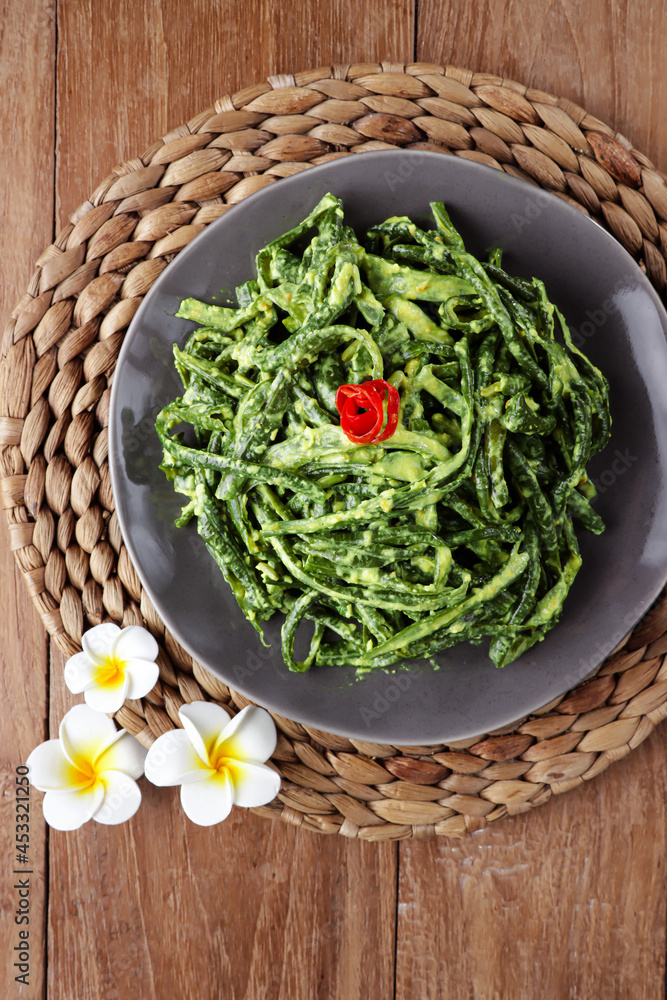 Jukut Bejek is Balinese traditional dish consist with long beans, coconut milk and other spices. Jukut Bejek is Balinese traditional dish consist with long beans, coconut milk and other spices.