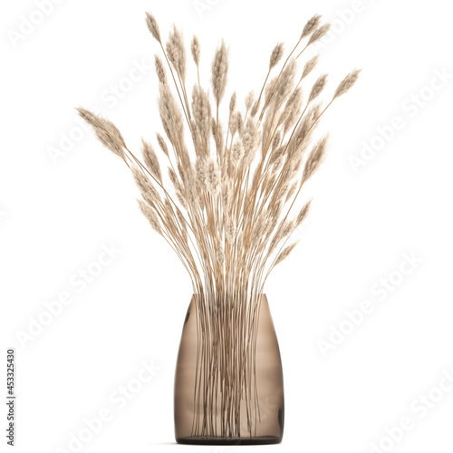 bouquet of dried flowers in a vase with white reeds on a white background