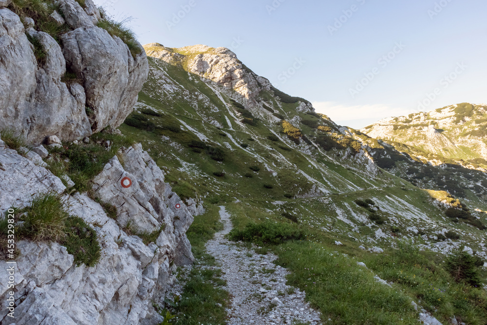 Marked hiking path in the mountains in European Alps