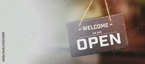 Modern, door sign we are open, after COVID 19.
