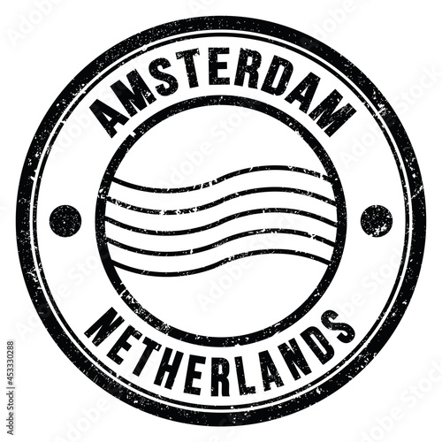 Photography AMSTERDAM - NETHERLANDS, words written on black postal stamp