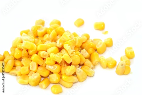 Corn seeds on white background, cooked sweet corn, top view
