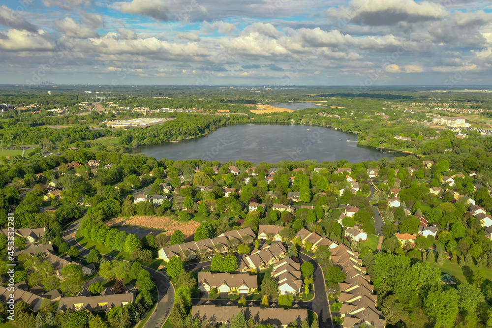 Suburbs Surround Lake Down Minneapolis in Far Distance