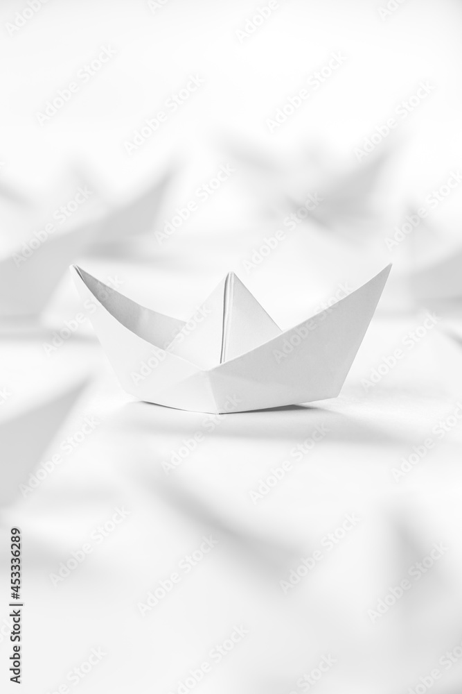 White paper boats or Origami boats on white background. White paper boats or Origami boats on white background.