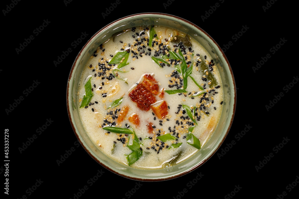 Japanese food: soup on black background. top view composition. Japanese food: soup on black background. top view composition.