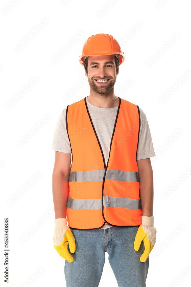 Cheerful builder in helmet looking at camera isolated on white Cheerful builder in helmet looking at camera isolated on white