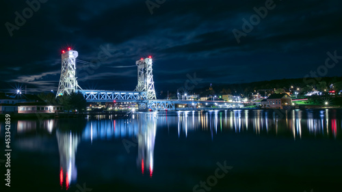 The Portage Lake Lift Bridge connects the cities of Hancock and Houghton, was built in 1959. #453342859