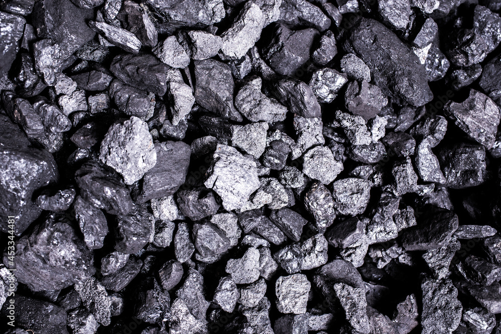 Top view of a coal mine mineral black for background. Used as fuel for industrial coke. Top view of a coal mine mineral black for background. Used as fuel for industrial coke.