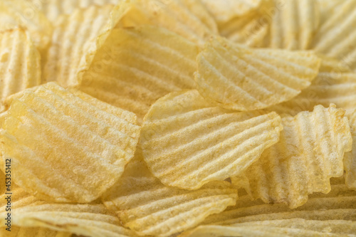  Food background. Potato chips close up. Organic food. Macro