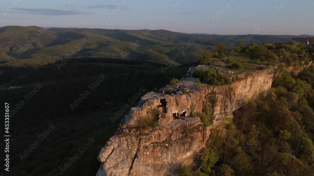 Beautiful landscape view of the mountains at sunset, shooting from a bird's eye view. Time interval. High quality 4k footage