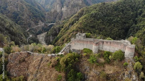 Vlad Tepes Dracula Poenari castle on top of the hill 4K drone shot photo