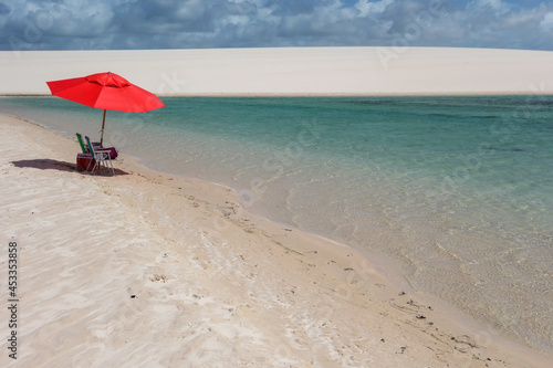 paradisiacal concept, rest and relaxation, tropical summer, blue water and white sand