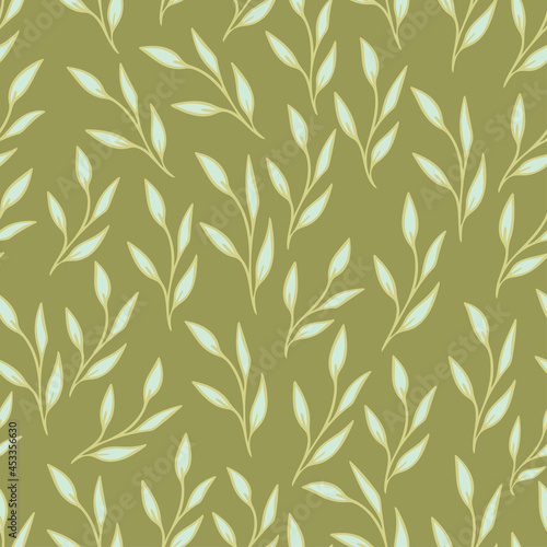 Seamless vector pattern with leaves in greenl colors. Surface design for wallpaper, textile, paper etc.  photo