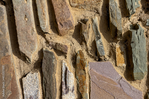 Stone wall backgrounds for working design, various solutions and structures, top angle, close-up. photo