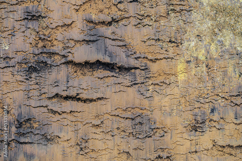 Geological slice of natural clay ground. Texture of flat surface natural red-brown clay.