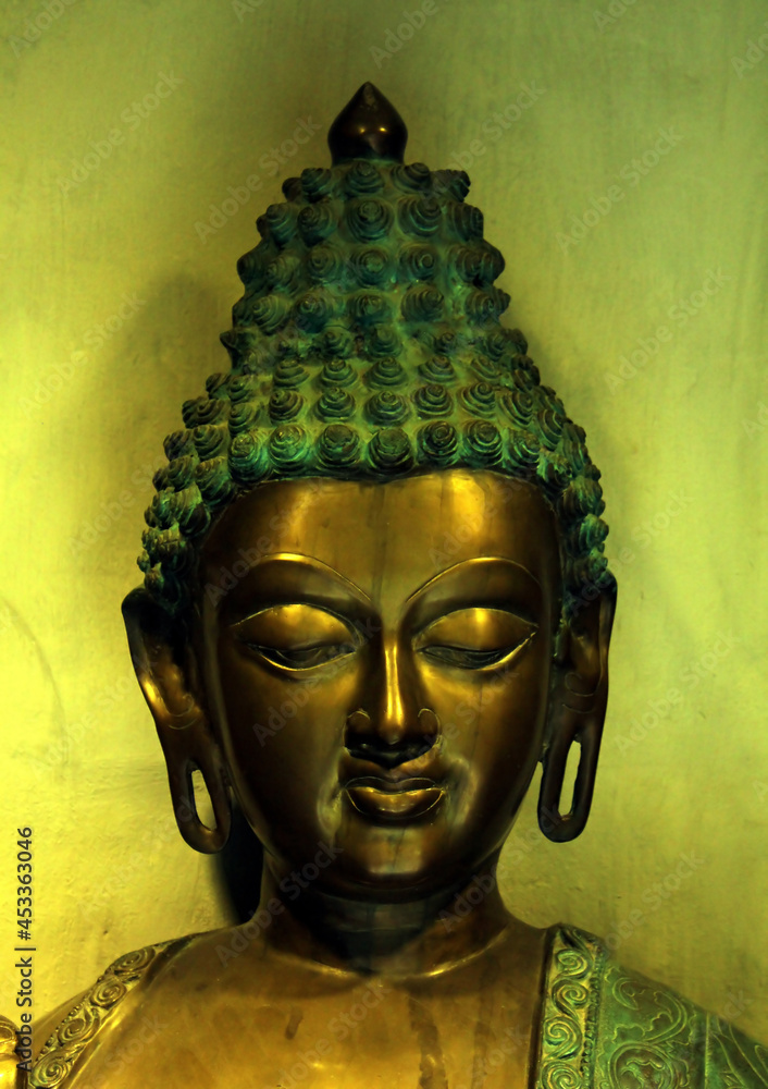 Head of a bronze buddha statue Head of a bronze buddha statue