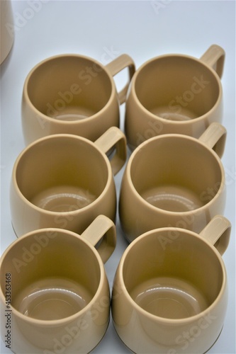 Vintage plastic pitcher and mugs