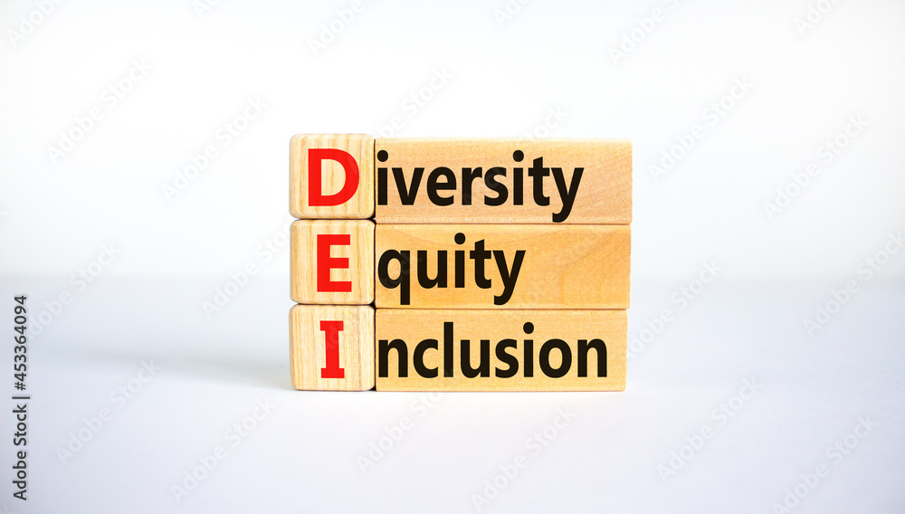 DEI, Diversity, equity, inclusion symbol. Wooden blocks with words DEI, diversity, equity, inclusion on beautiful white background. Business, DEI, diversity, equity, inclusion concept. DEI, Diversity, equity, inclusion symbol. Wooden blocks with words DEI, diversity, equity, inclusion on beautiful white background. Business, DEI, diversity, equity, inclusion concept.